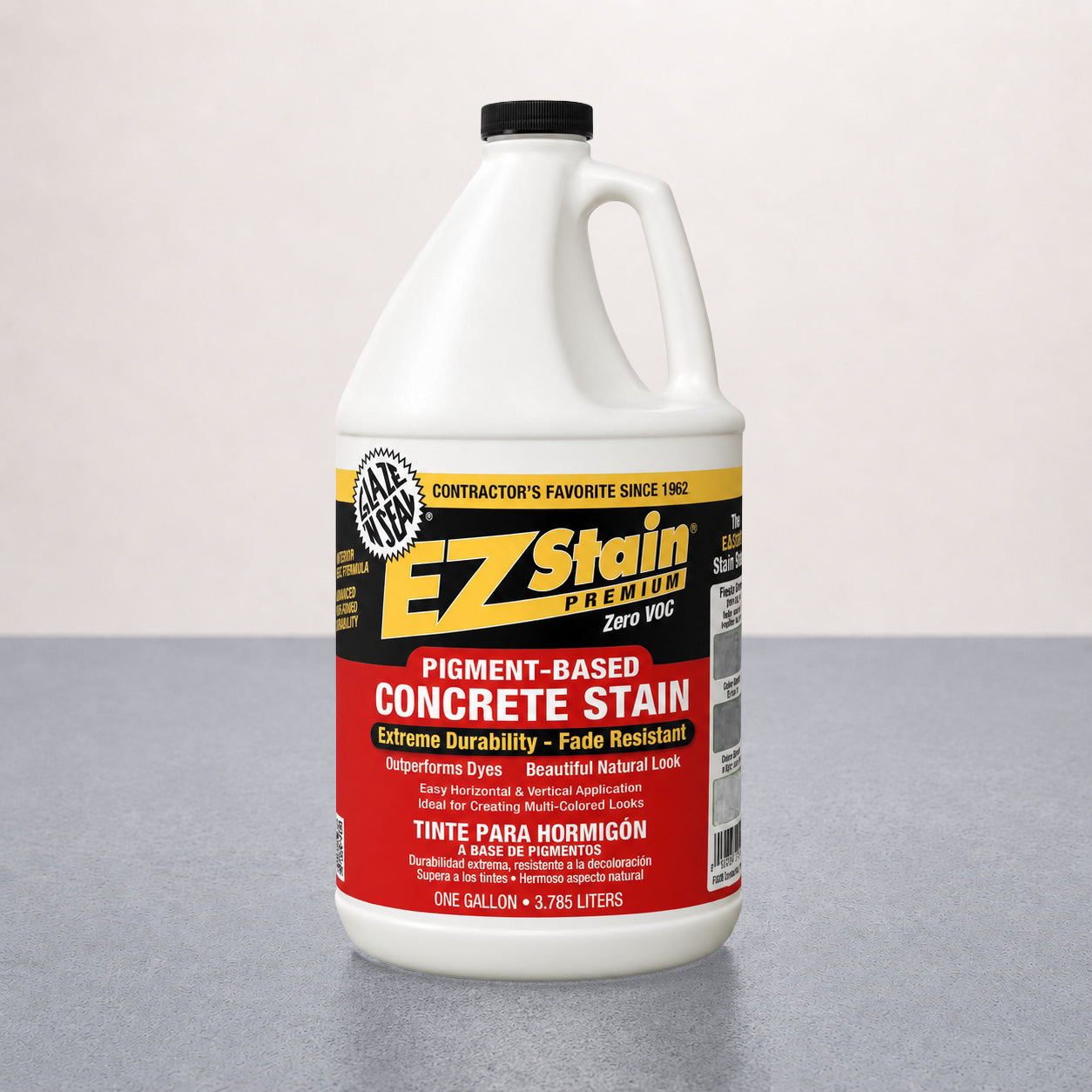 Bottle of EZ Stain concrete stain on a gray surface with a white background
